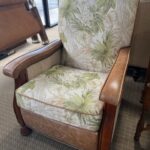 A chair with a floral pattern on it.